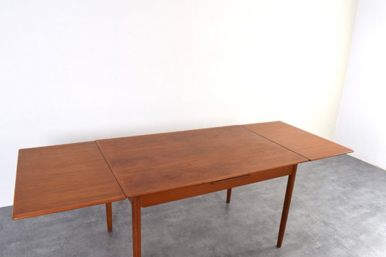 Image 1 of Table de salle à manger extensible en teck danois, style milieu du XXe siècle, années 1960.