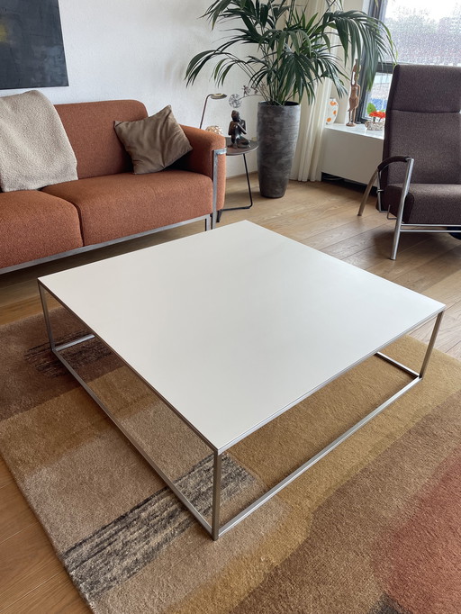 Metaphor coffee table, 110 m x 110 cm, height 36, ceramic top with brushed legs, matt