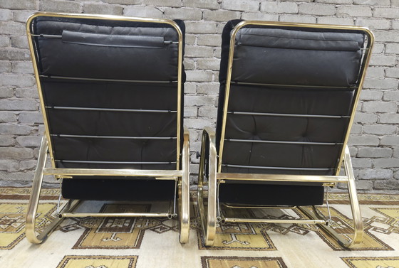 Image 1 of Paire de fauteuils noir système "Morris "1970