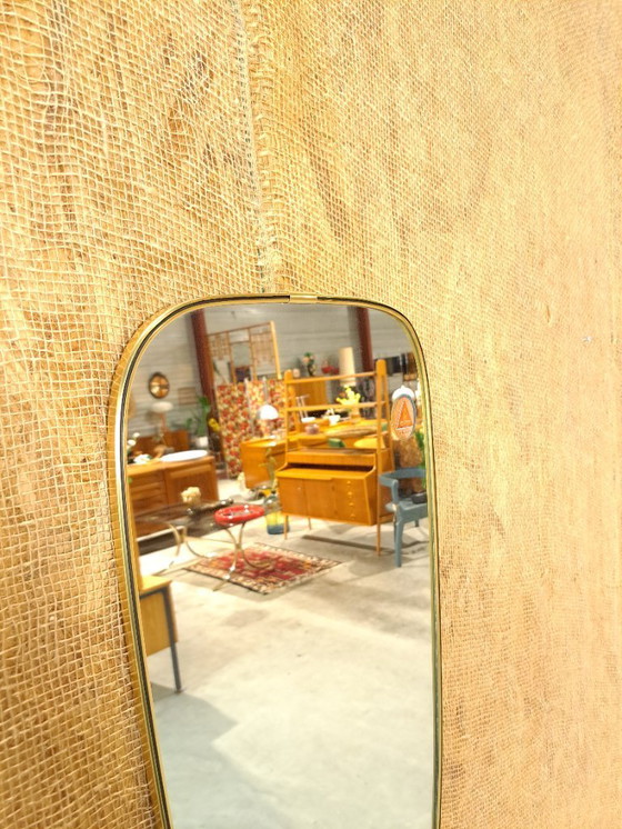 Image 1 of Jaren 50 spiegel met messing en zwarte rand