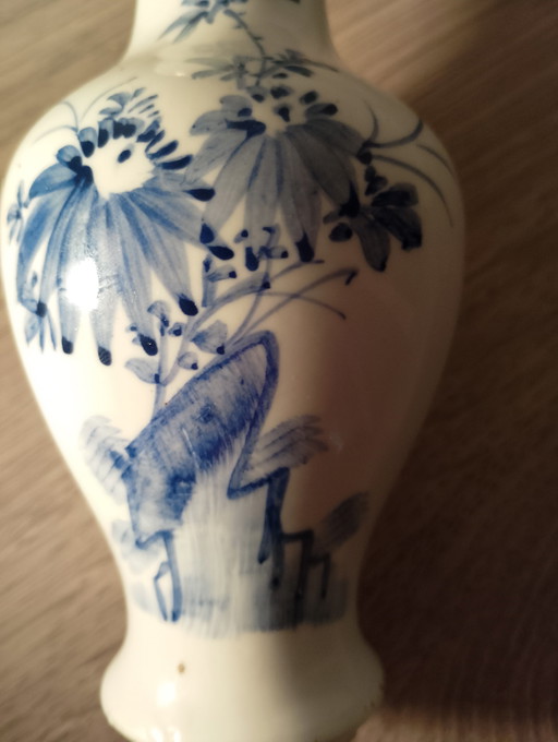 Antique small blue and white Chinese porcelain vase with floral decoration and monogram