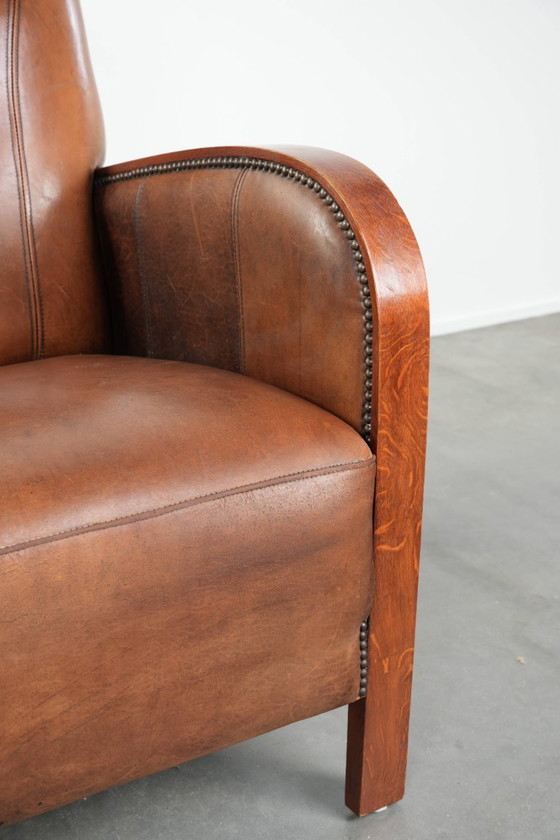 Image 1 of Beautiful sheepskin armchair in Art Deco style with wooden armrests