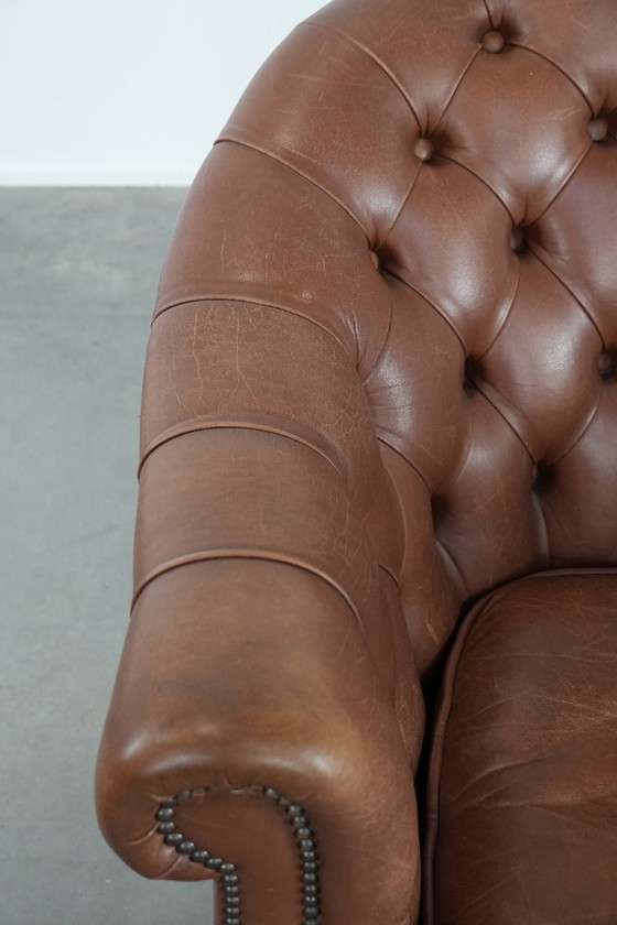 Image 1 of Poltrona Chesterfield in pelle in stile inglese con borchie decorative