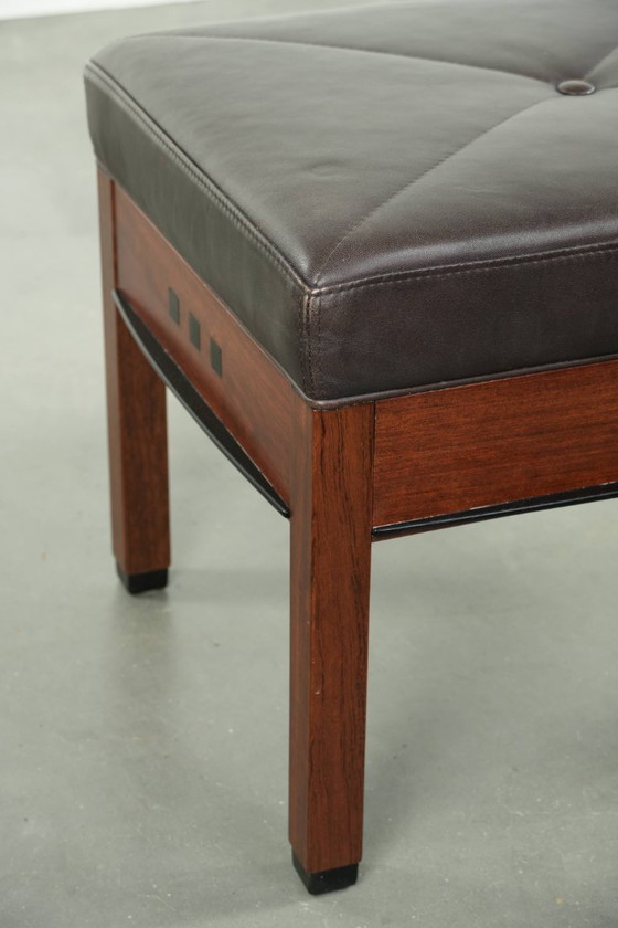 Image 1 of Luxe Schuitema Art Deco design set bestaande uit een fauteuil en hocker uit de Decoforma serie in chocolade bruin rundleer