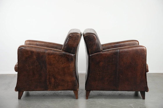 Image 1 of 2 eleganti poltrone di design in pelle di pecora con splendidi colori intensi e un design senza tempo