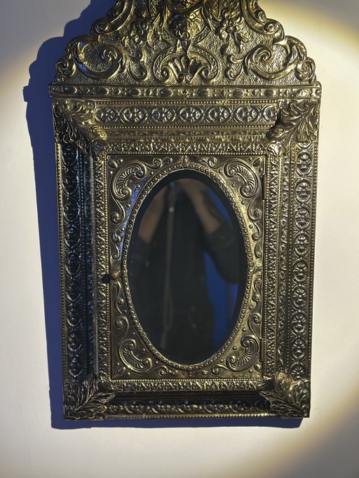 Old Dutch interior, beautiful antique mirror with key cabinet.
