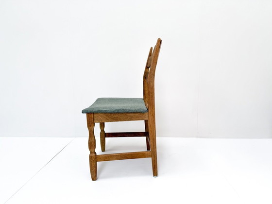 Image 1 of 4x Henning Kjærnulf eiken Razorblade eetkamerstoelen