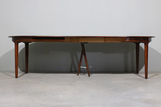 Image 1 of Table de salle à manger extensible en bois de rose par Henning Kjaernulf