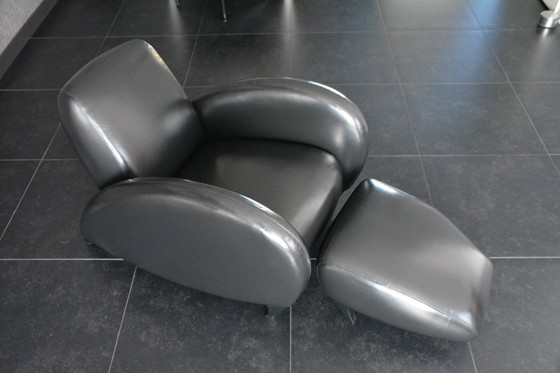 Image 1 of Designer armchair with footstool