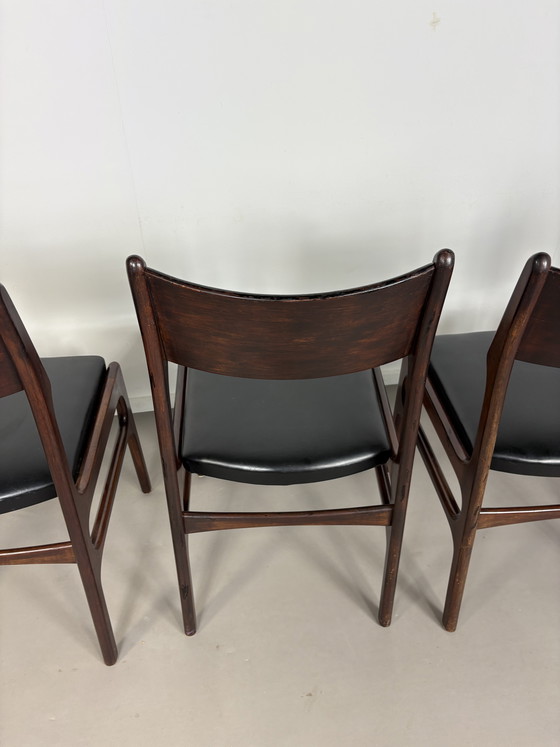 Image 1 of Set off 4 Vintage Palissander Wood With Black skai Leather dining chairs