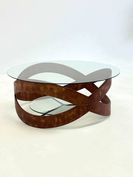 Vintage round coffee table with sculptural wooden frame