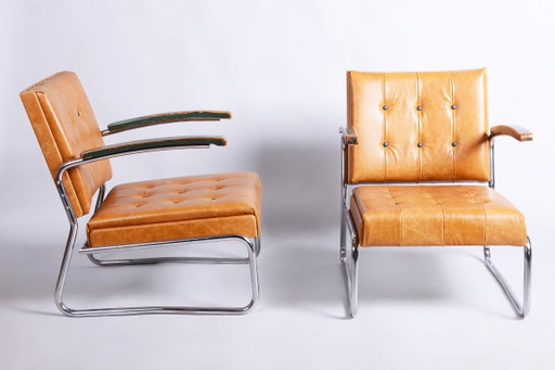 Een paar gerestaureerde Bauhaus-fauteuils van Mücke-Melder, beukenhout, chroom, Tsjechië, jaren 1930. – Leather, Wood