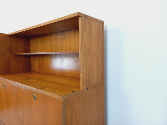 Image 1 of Louis Paolozzi's vintage modernist secretary bookcase for Monopoly in teak and metal from the 60s