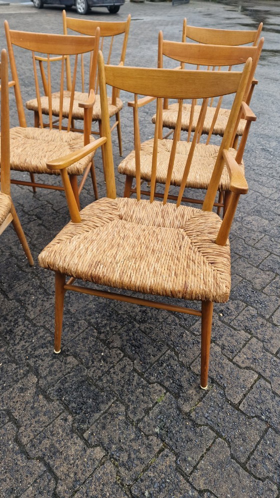 Image 1 of Juego de comedor de los años 50, madera de haya y caña – 6 sillas + banco, estilo Arno Lambrecht