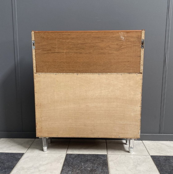 Image 1 of Teak tall sideboard on lucite legs 1960s