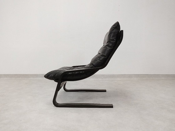 Image 1 of  high-back lounge chair in black leather