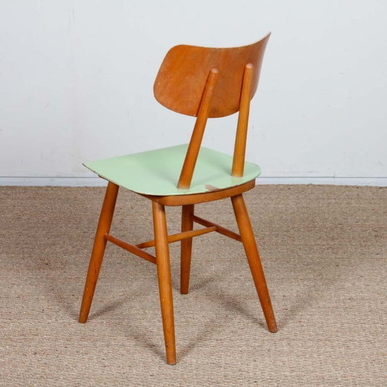Image 1 of Groene stoel geproduceerd door Ton in de jaren 1960