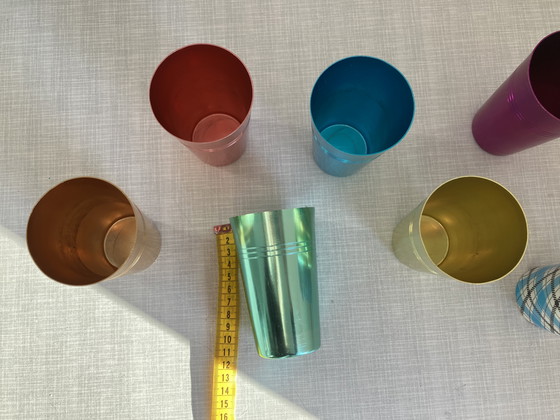 Image 1 of 6 metal retro cups in a tube