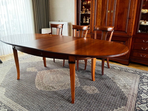 Cherry wood dining area with 6 chairs