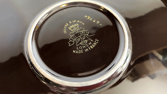 Image 1 of PLAT LONGWY aux LYS earthenware signed L. VALENTI