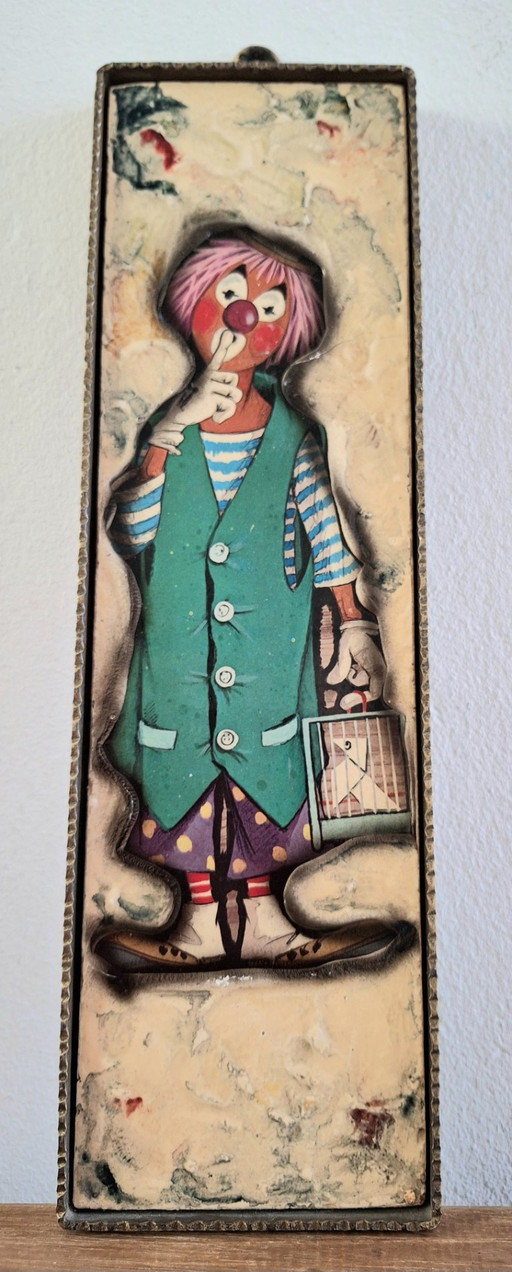 Clown avec cage à oiseaux