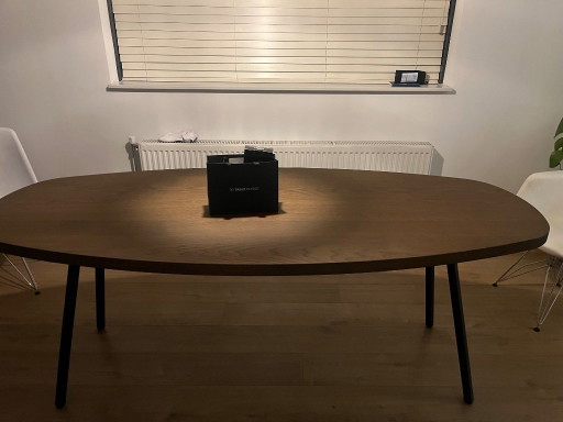 Table du Sud Dining table, brown wood with black legs