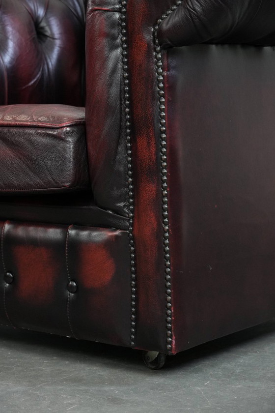 Image 1 of Englischer Chesterfield-Ledersessel auf Rollen, verziert mit Ziernieten