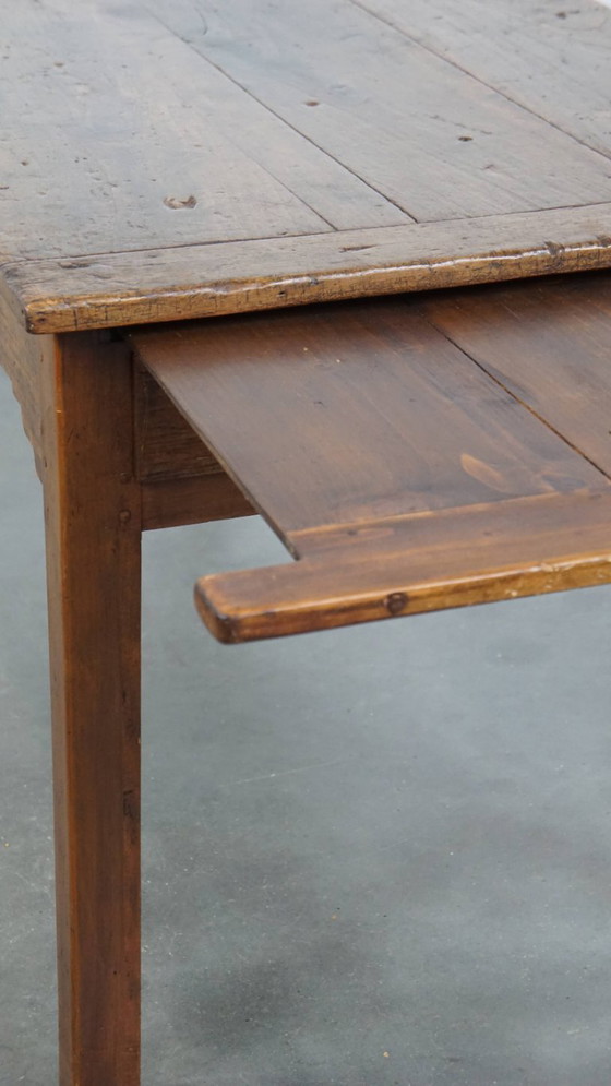 Image 1 of Antique French dining table from the early 19th century with two drawers and a breadboard / extendable top