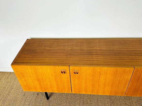 Image 1 of Minimalist Scandinavian sideboard in teak with black metal legs, 1960