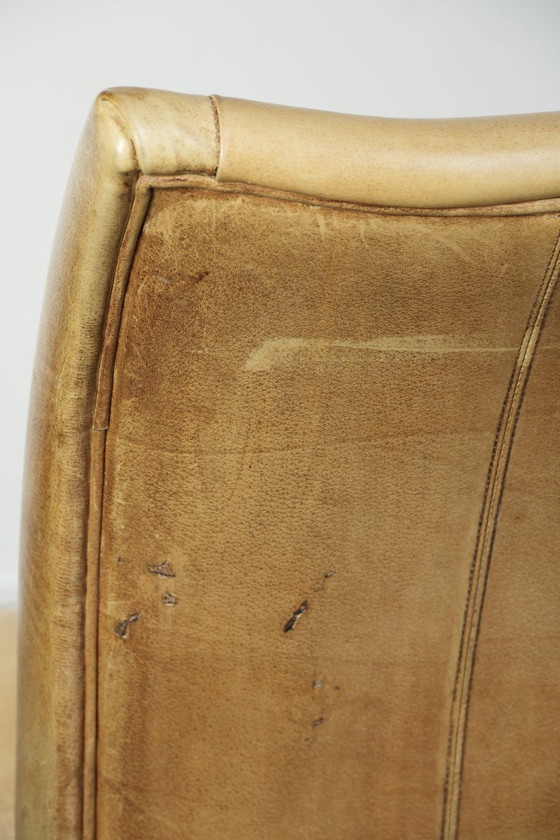 Image 1 of 6 chaises de salle à manger en cuir de vachette clair, avec une belle couleur claire, une assise confortable et un dossier haut.