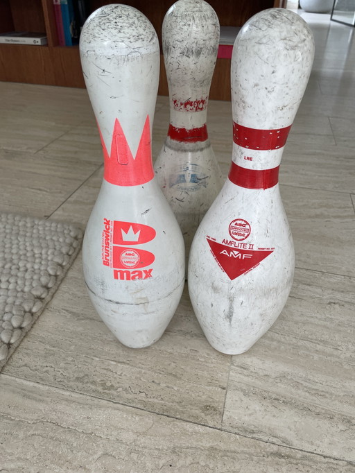 3 quilles de bowling