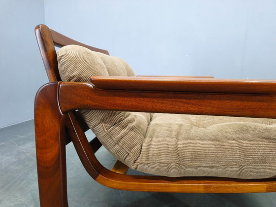 Image 1 of Twee Scandinavische loungestoelen uit de jaren 70, gemaakt van hout met corduroy bekleding.