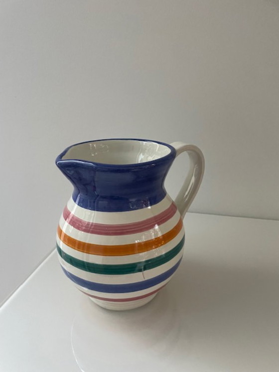 Image 1 of Handgemaakte vintage schenkkan met kleurrijke strepen