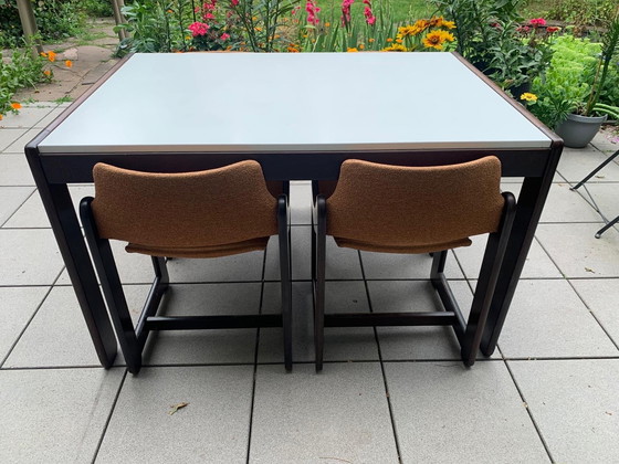 Image 1 of Wengé eetkamer nieuw gestoffeerd tafel met origineel formica blad.