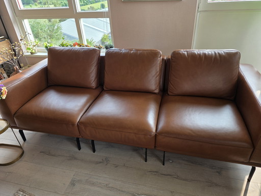Ledersofa mit Fußhocker
