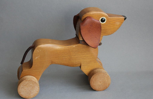Pull-along dachshund toy with leather ears, wooden figure, vintage decoration, old toy