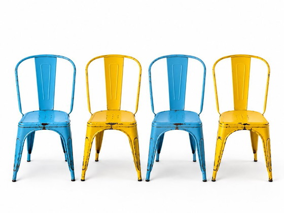 Set of 4 Tolix chairs, 2 yellow, 2 blue. 1960s edition. – Dining chairs, Metal (photo 2 of 8)
