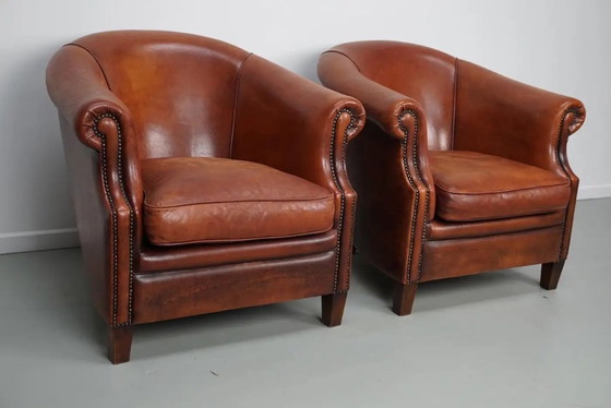 Image 1 of Vintage Nederlandse clubfauteuils in cognackleurig leer, set van 2