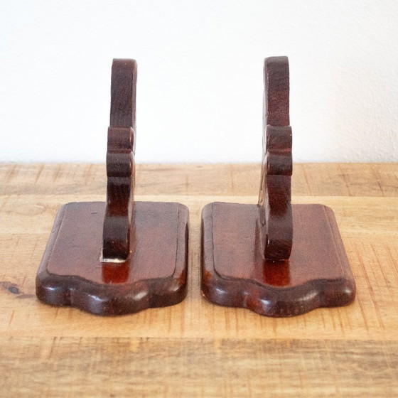 Image 1 of Vintage handgemaakte houten decoratieve boekensteunen