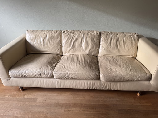 Leather three-seater sofa with footstool - Brand Touché