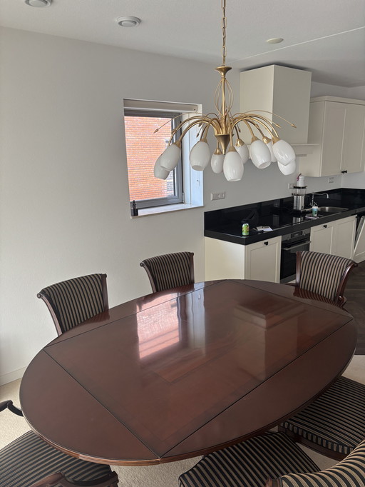 Antique table with chairs attached
