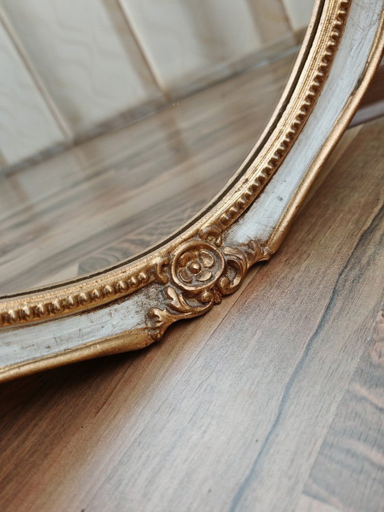 Image 1 of Oval mirror with wooden frame, white, gold from an estate