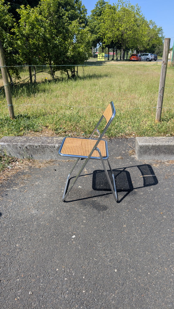 Image 1 of Chaise pliante cannée et acier chromé dans le goût de Castelli, Vintage