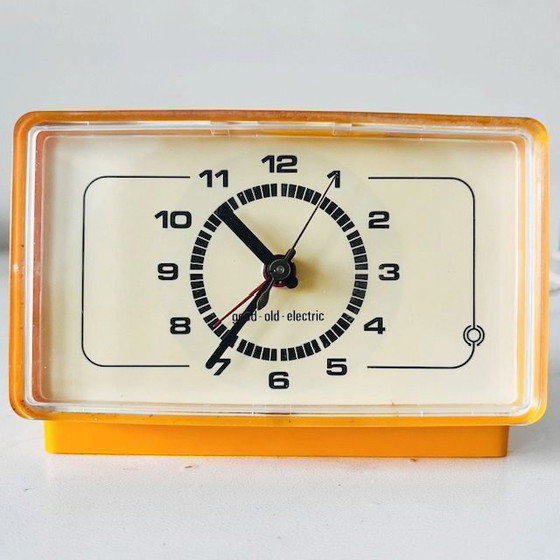 Image 1 of Vintage mid-century electric alarm clock Good-old-Electric plastic yellow 1970s