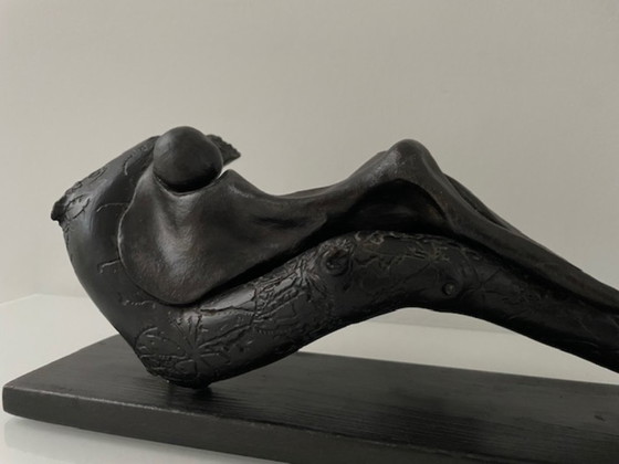 Image 1 of Expressive wooden sculpture with a reclining figure