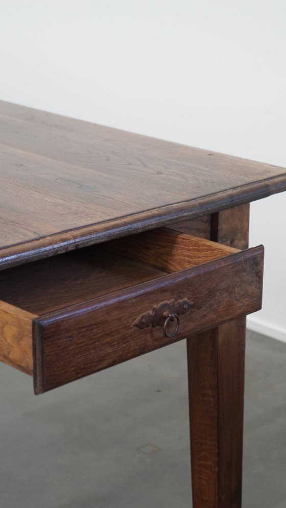 Image 1 of Table de salle à manger ancienne en chêne du début des années 1900 avec plateau rabattable d'un côté