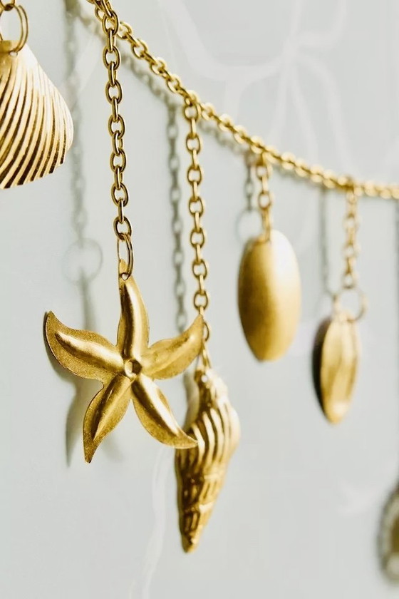 Image 1 of Wanddeco wanddecoratie met gouden zeethema-bedels