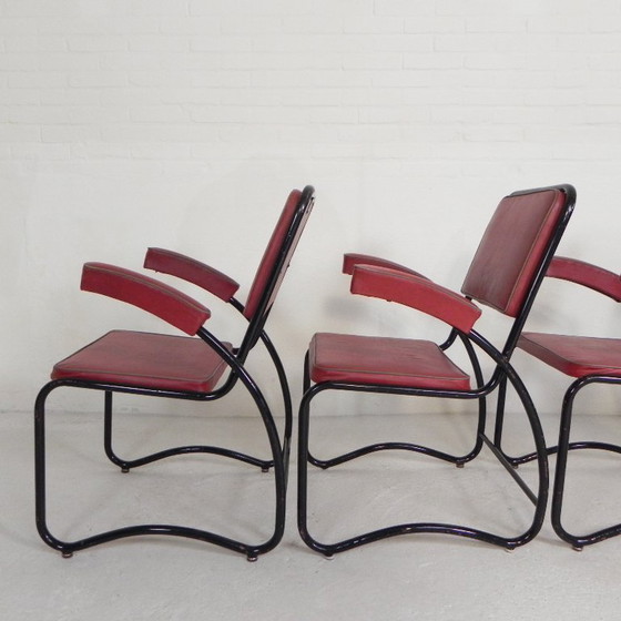 Image 1 of Conjunto de 4 sillones y mesa de centro con estructura tubular de estilo Bauhaus, década de 1950.