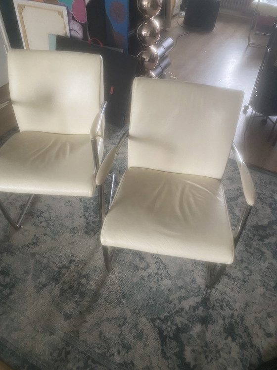 Image 1 of Nomada vintage kalfsleren eetkamerstoelen crème wit 