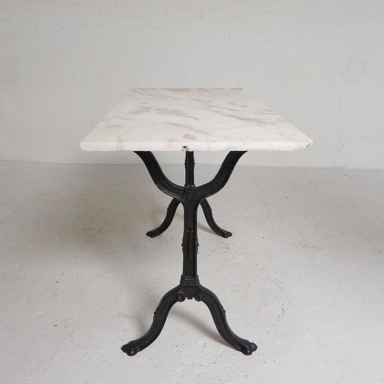 Image 1 of Table de bistrot avec plateau en marbre sur piètement en fonte, PARIS, années 1930
